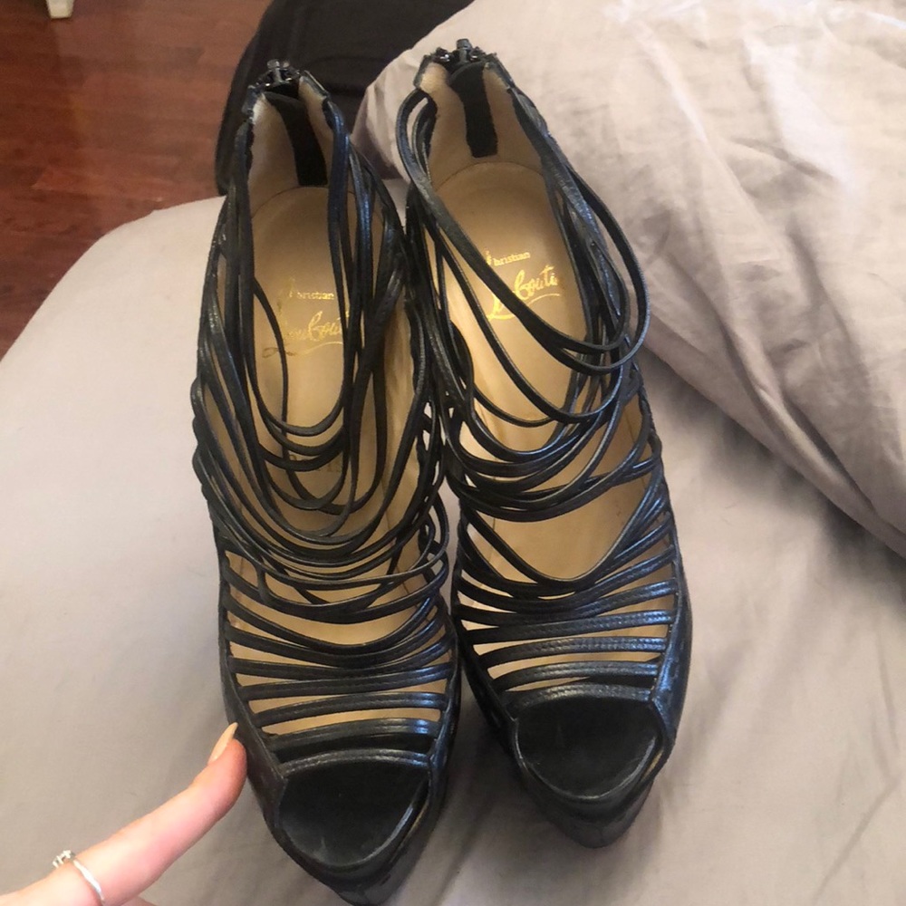 Christian Louboutin black pumps
